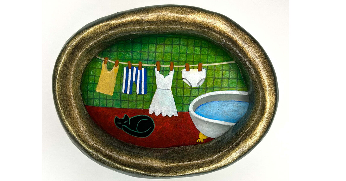 風呂場で寝る猫